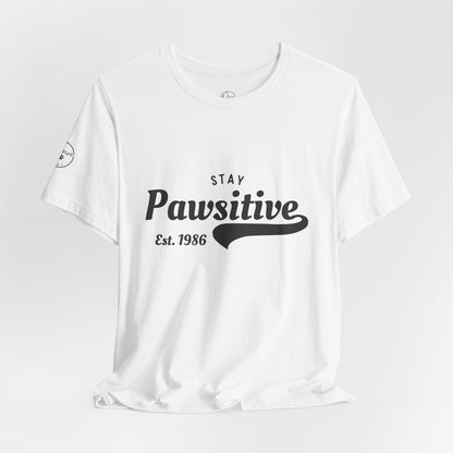 Stay Pawsitive Unisex Jersey Tee, Positive Vibes Shirt, Gift for Animal Lovers, Casual Everyday Wear, Fun Humor T-Shirt, Pet-themed Tee